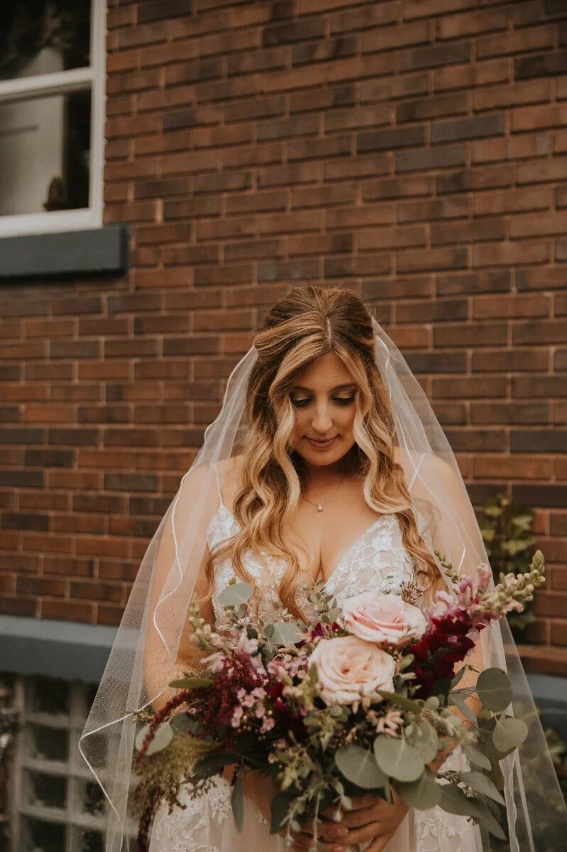 Detailed bridal hair styling by Artistry Lounge Bridal